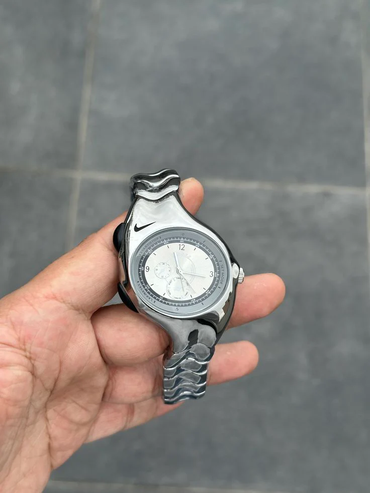 Nike traix silver